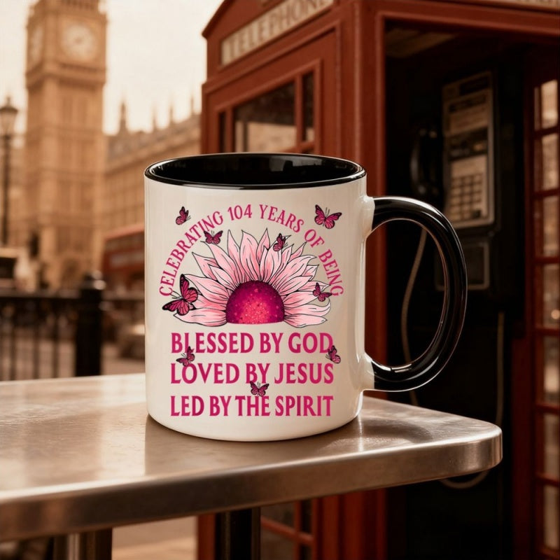 Tailorly Black Accent 11 oz Mug - pink sunflower illustration celebrating 104 years of being blessed