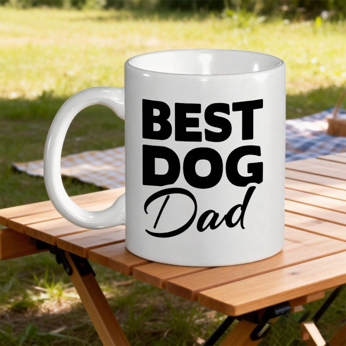 Tailorly White Ceramic 11 oz Mug - Best Dog Dad White Ceramic Vessel Standing On Rustic Outdoor Wooden Picnic Table Mug
