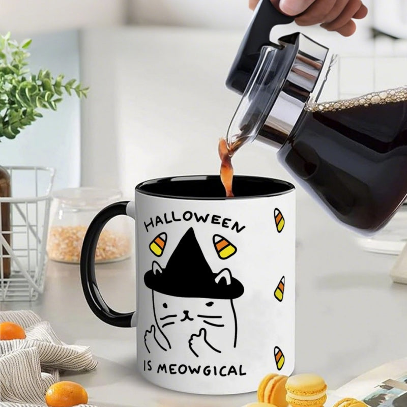 Tailorly Black Accent 11 oz Mug - witch cat with candy corn and the phrase "halloween is meow"