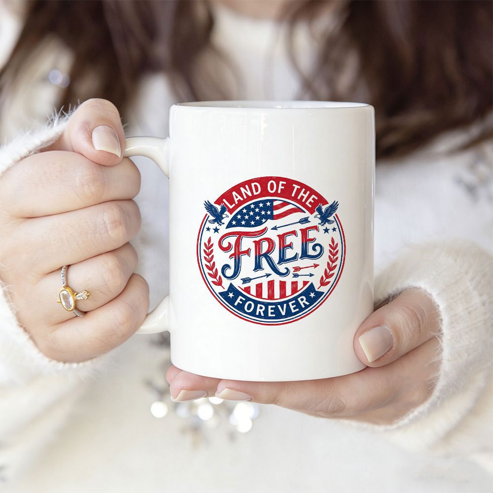 Tailorly White Ceramic 11 oz Mug - Land Of The Free Forever Patriotic Circular Emblem With Stars And Stripes Featuring Stylized Arrows And Wings Badge