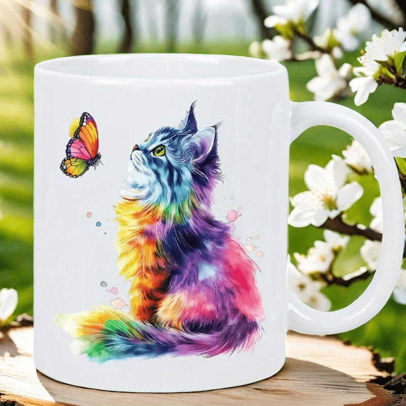 Tailorly White Ceramic 11 oz Mug - Vibrant Watercolor Rainbow Feline Looking Up At A Small Fluttering Butterfly Cat