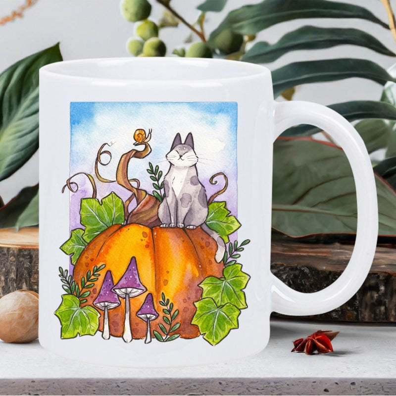 Tailorly White Ceramic 11 oz Mug - Whimsical Grey Cat Sitting Atop A Vibrant Orange Autumn Pumpkin