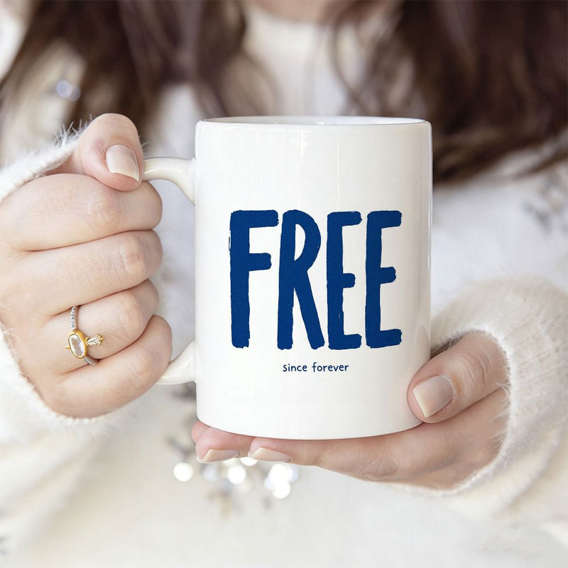 Tailorly White Ceramic 11 oz Mug - Free Since Forever Clean White Ceramic Vessel Held Gently In Two Hands Mug