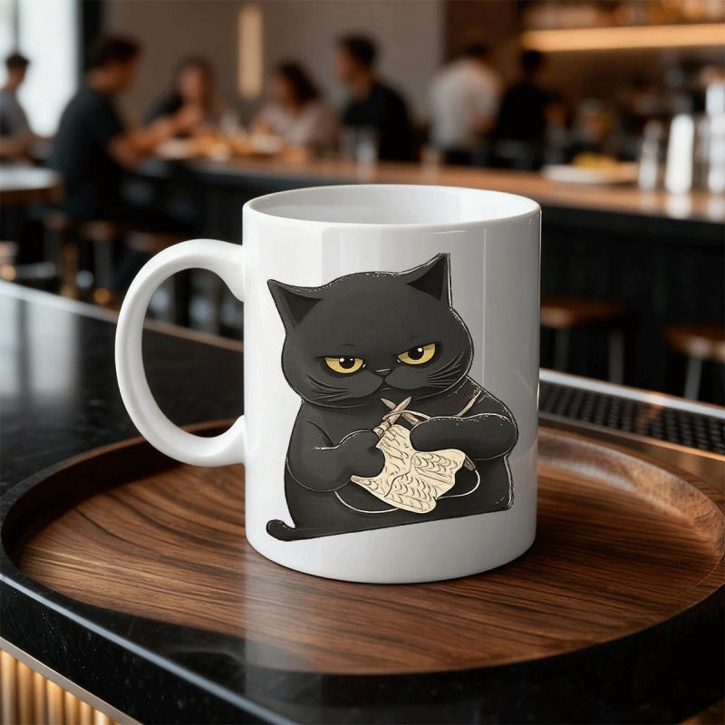 Tailorly White Ceramic 11 oz Mug - Grumpy Black Cat Knitting With White Yarn And Wooden Needles Cat