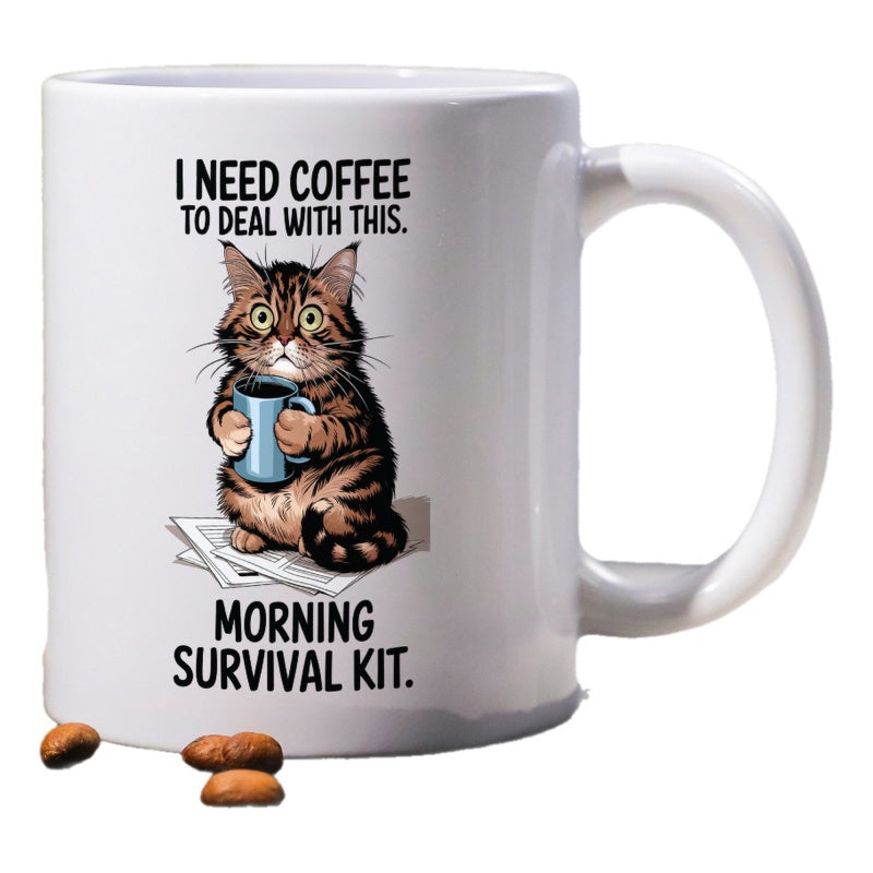 Tailorly White Ceramic 11 oz Mug - I Need Coffee To Deal With This Morning Survival Kit Wide Eyed Brown Tabby Cat Holding Small Blue Mug Sitting On Newspapers Cat
