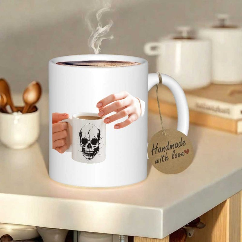 Tailorly White Ceramic 11 oz Mug - Handmade With Love Human Hands Holding A Small White Cup Featuring A Detailed Artistic Skull