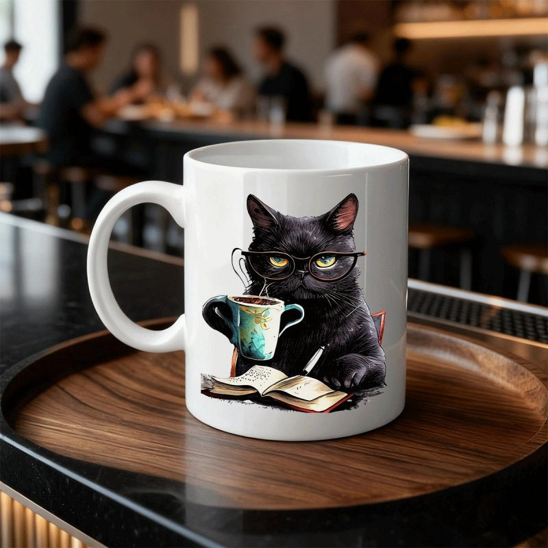 Tailorly White Ceramic 11 oz Mug - Grumpy Black Cat Wearing Glasses Reading Book Holding Steaming Coffee Cat