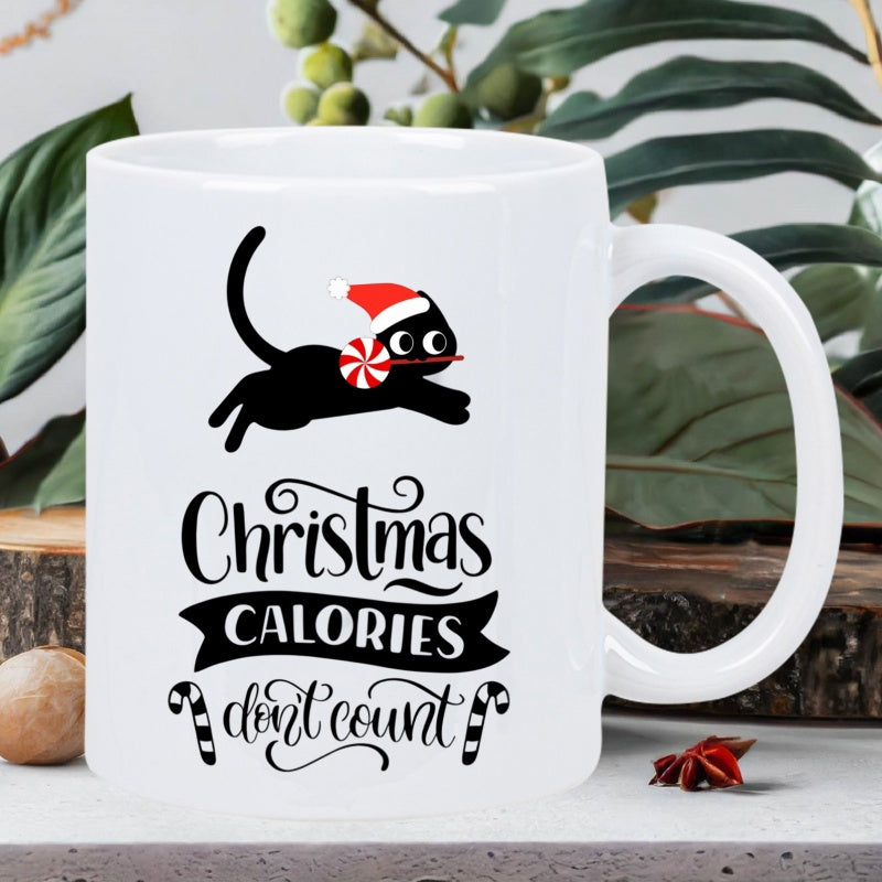 Tailorly White Ceramic 11 oz Mug - Christmas Calories Don't Count Cute Black Kitten Wearing A Festive Red Santa Hat Biting Candy Cat