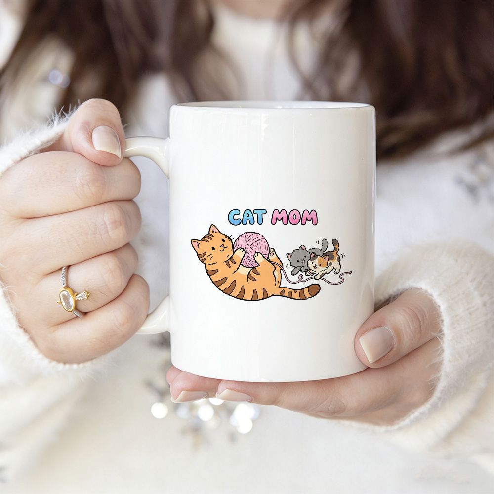 Tailorly White Ceramic 11 oz Mug - Cat Mom Playful Orange Tabby Lying Down Holding Yarn Ball With Small Kittens Cat