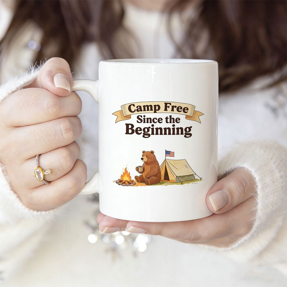 Tailorly White Ceramic 11 oz Mug - Camp Free Since The Beginning Brown Bear Sitting Near A Campfire Next To A Tent Bear