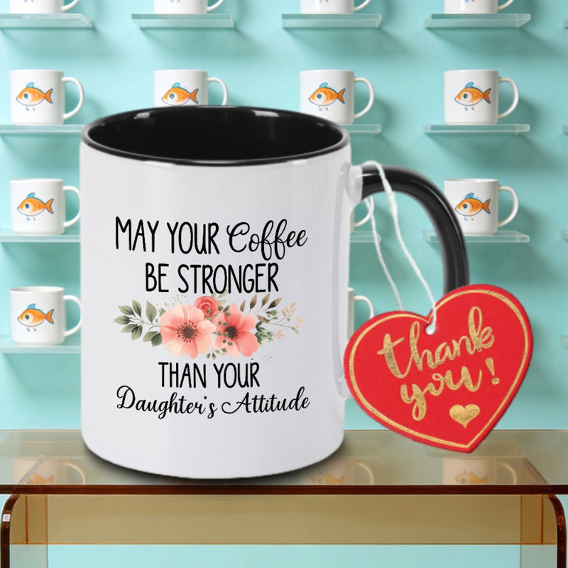 Tailorly Black Accent 11 oz Mug - Stronger Than Your Daughter's Attitude logo