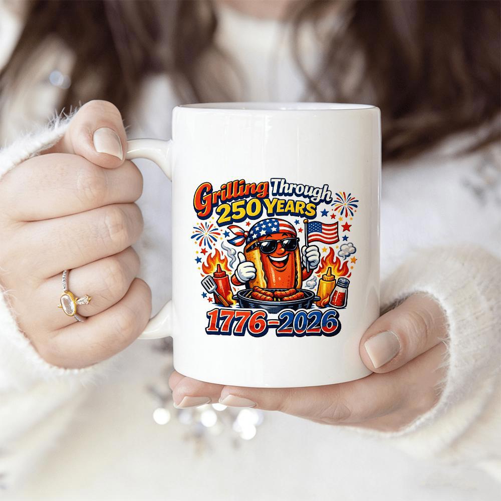 Tailorly White Ceramic 11 oz Mug - Grilling Through 250 Years 1776 2026 Cartoon Bullet Character Wearing Sunglasses Grilling At A Festive Patriotic Celebration Mug