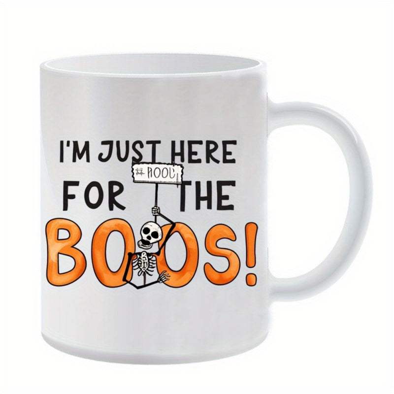 Tailorly White Ceramic 11 oz Mug - Im Just Here For The Boos Funny Hand Drawn Halloween Graphic Featuring A Tiny Sign Holding Skeleton