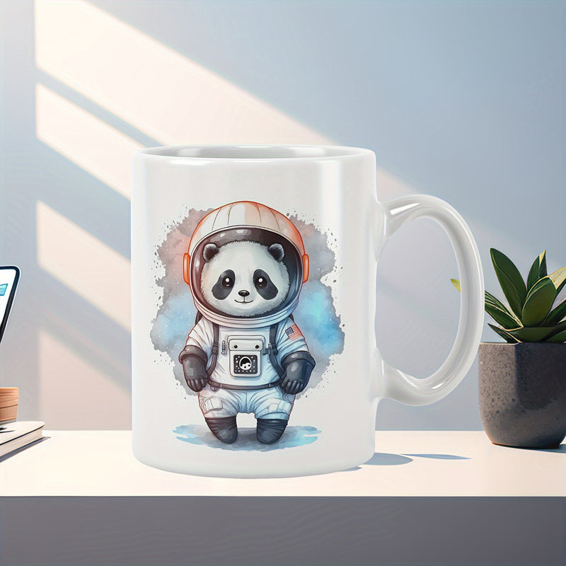Tailorly White Ceramic 11 oz Mug - Charming Little Astronaut Panda Floating Within A Soft Blue Watercolor Splash Panda