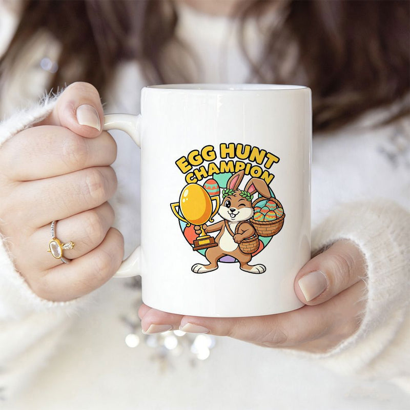Tailorly White Ceramic 11 oz Mug - Egg Hunt Champion Cheerful Cartoon Rabbit Holding Golden Trophy Among Colorful Easter Eggs Bunny
