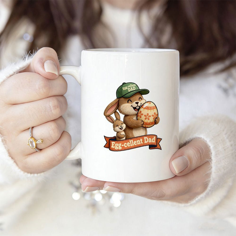 Tailorly White Ceramic 11 oz Mug - Egg-cellent Dad Happy Cartoon Bunny Wearing A Green Cap Holding Decorative Easter Egg Rabbit