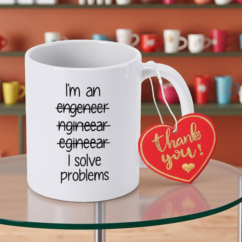 Tailorly White Ceramic 11 oz Mug - Im An Engineer I Solve Problems Thank You Minimalist White Ceramic Cup Resting On Reflective Clear Glass Surface Mug