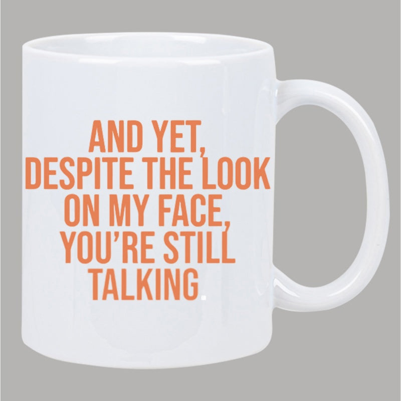 Tailorly White Ceramic 11 oz Mug - And Yet Despite The Look On My Face Youre Still Talking Minimalist Ceramic Vessel Featuring Bold Peach Colored Typographic Quote