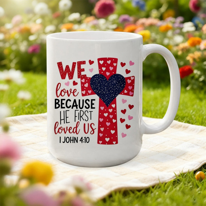 Tailorly White Ceramic 11 oz Mug - We Love Because He First Loved Us 1 John 4 19 Red Patterned Design With Hearts Surrounding A Large Dark Central Cross