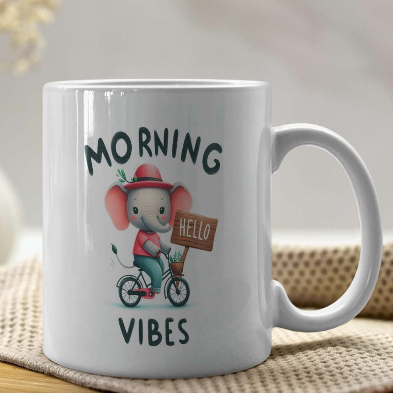 Tailorly White Ceramic 11 oz Mug - Morning Vibes Adorable Little Cartoon Character Wearing A Hat Riding A Tiny Bicycle Elephant