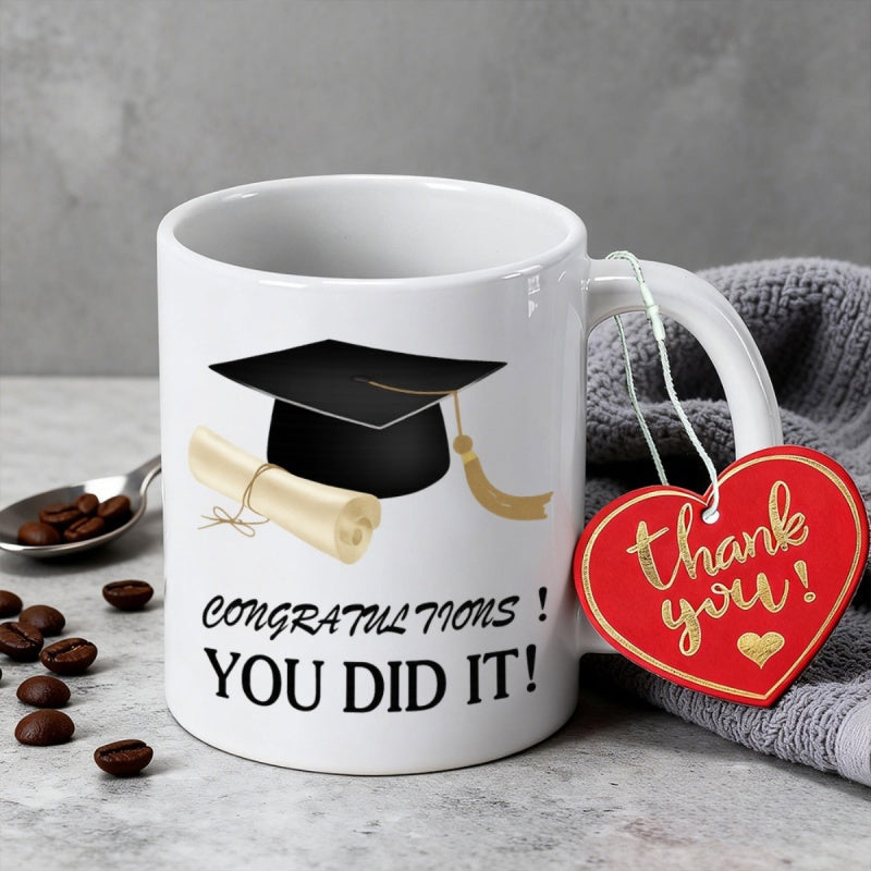 Tailorly White Ceramic 11 oz Mug - Congratulations You Did It Classic Black Mortarboard With Golden Tassel Beside A Rolled Graduation Cap