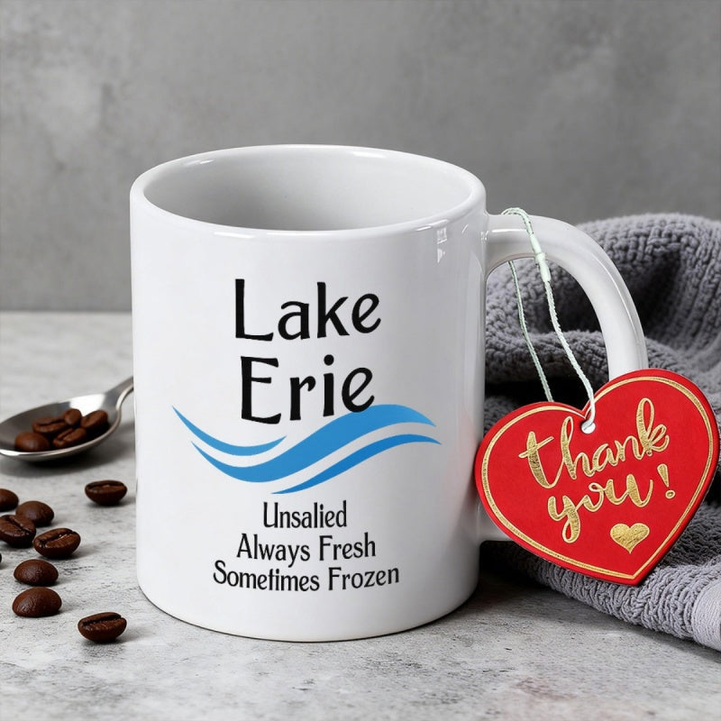 Tailorly White Ceramic 11 oz Mug - Lake Erie Unsalted Always Fresh Sometimes Frozen Featuring Minimalist Blue Waves Under Regional Typography Mug