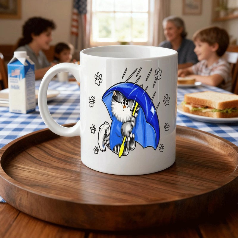 Tailorly White Ceramic 11 oz Mug - Fluffy Grey Tabby Sitting Under Blue Umbrella During Gentle Rain Cat