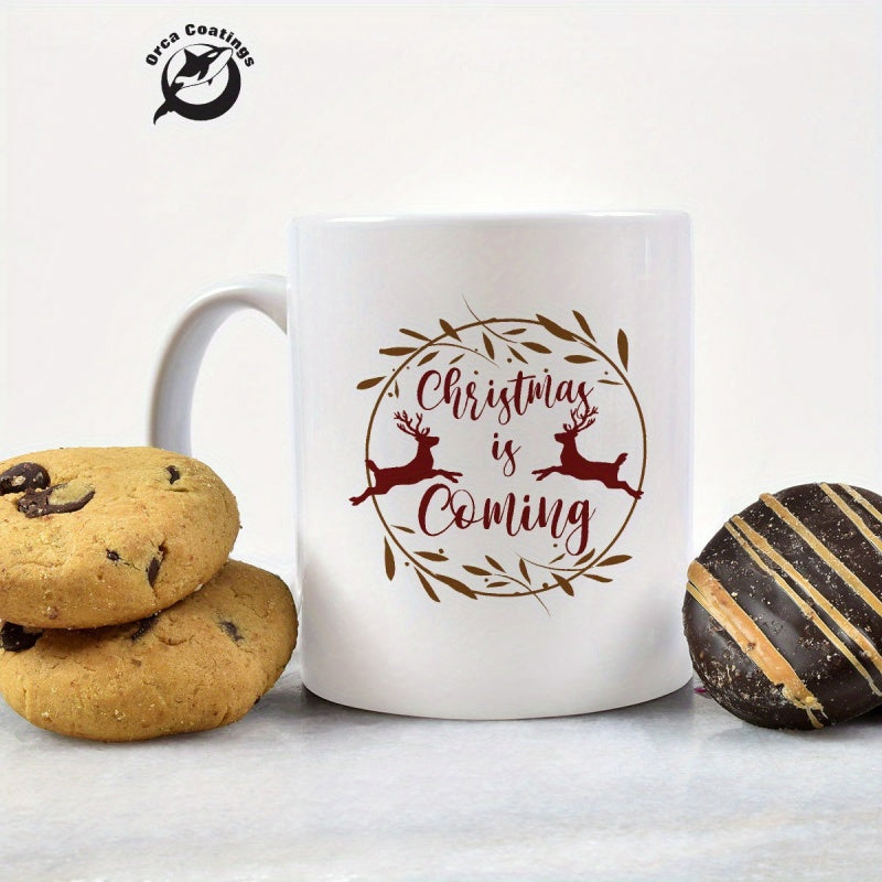 Tailorly White Ceramic 11 oz Mug - Christmas Is Coming Festive Circular Twig Wreath Border Encasing Two Leaping Silhouette Reindeer