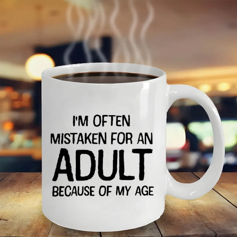 Tailorly White Ceramic 11 oz Mug - Im Often Mistaken For An Adult Because Of My Age Simple White Ceramic Coffee Cup On Rustic Wooden Mug