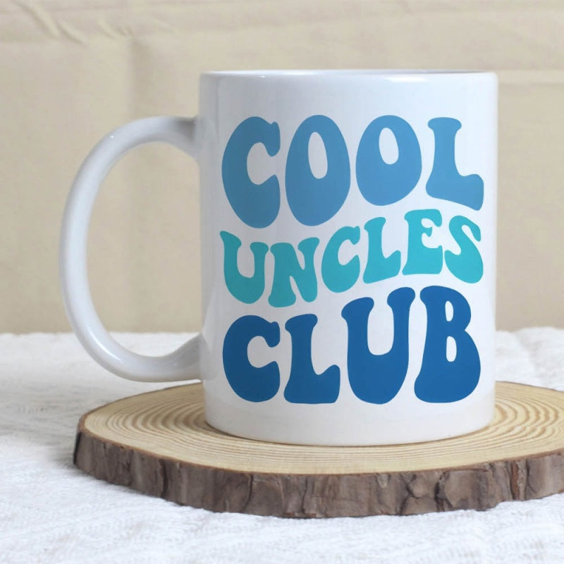 Tailorly White Ceramic 11 oz Mug - Cool Uncles Club Retro Groovy Blue Lettering On A White Glossy Surface Mug