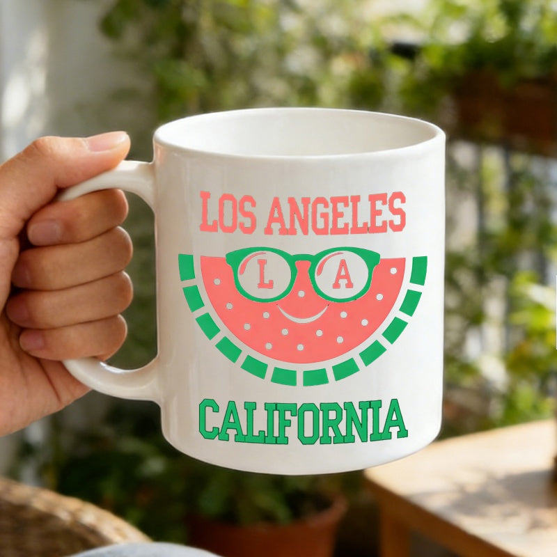 Tailorly White Ceramic 11 oz Mug - Los Angeles California La Smiling Fruit Slice Wearing Trendy Green Sunglasses Under Bright Sun Watermelon