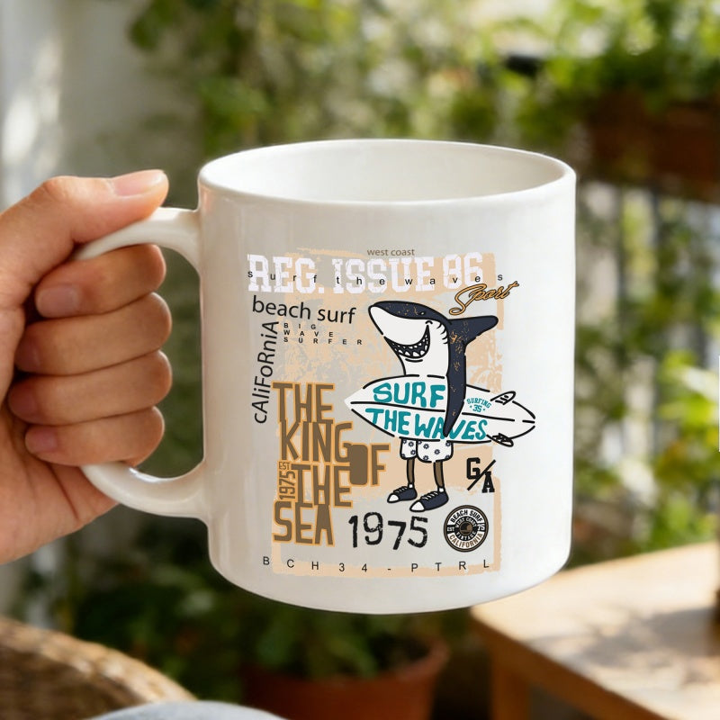 Tailorly White Ceramic 11 oz Mug - Reg Issue 86 California Beach Surf The King Of The Sea 1975 Surf The Waves Cool Cartoon Shark Holding A Surfboard On The Sandy
