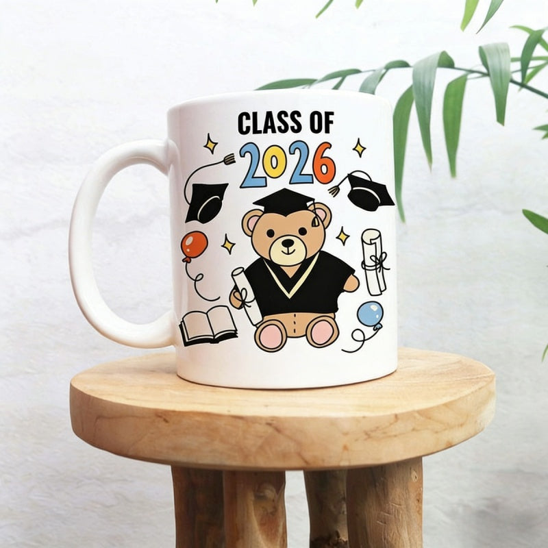 Tailorly White Ceramic 11 oz Mug - Class Of 2026 Cute Cartoon Graduation Wearing Gown Holding Diploma Among Floating Stars Bear