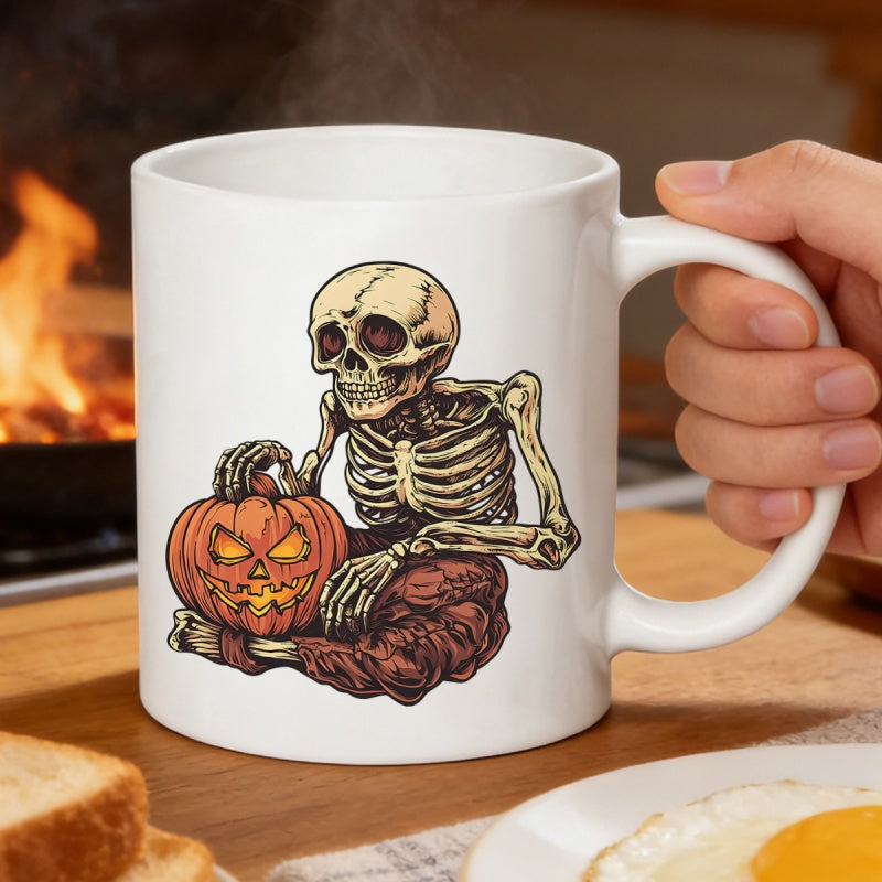 Tailorly White Ceramic 11 oz Mug - Spooky Halloween Sitting With Carved Glowing Jack O Lantern Skeleton