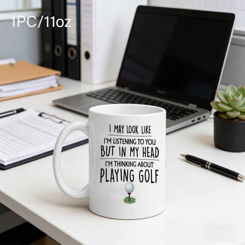 Tailorly White Ceramic 11 oz Mug - I May Look Like Im Listening To You But In My Head Im Thinking About Playing Golf White Dimpled Golf Ball Resting On A Bright