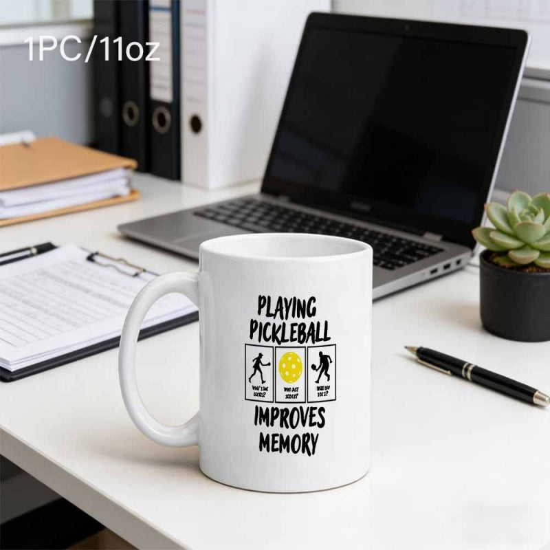 Tailorly White Ceramic 11 oz Mug - Playing Pickleball Improves Memory Minimalist Silhouette Figures Playing Among A Vibrant Yellow Graphic Mug