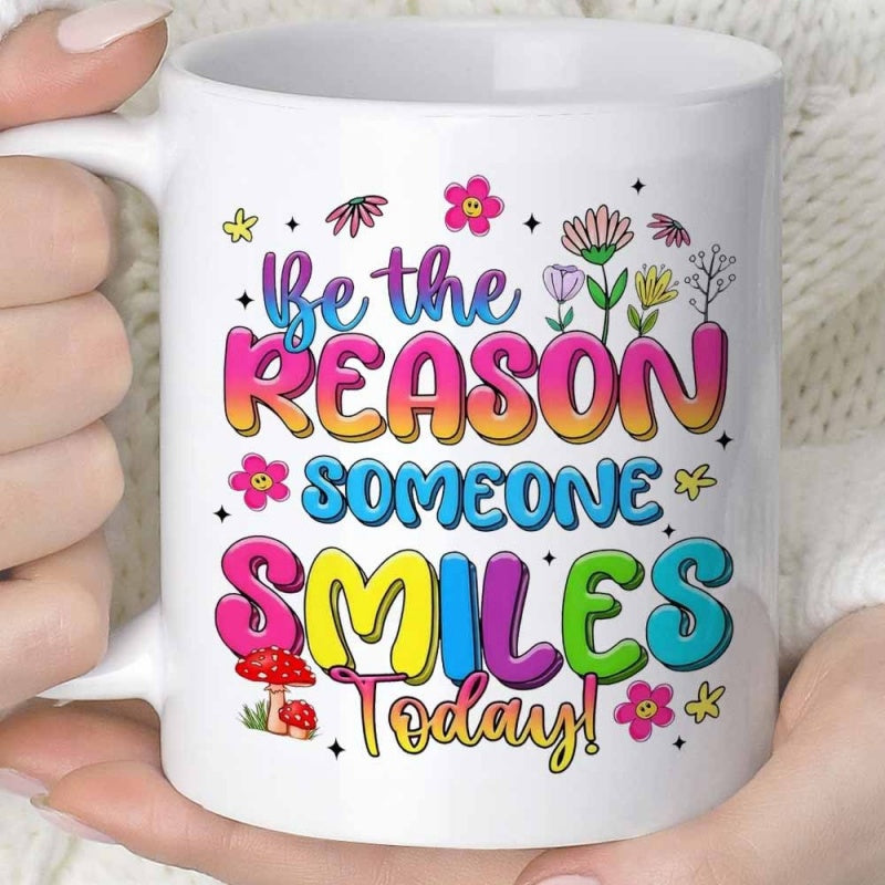 Tailorly White Ceramic 11 oz Mug - Be The Reason Someone Smiles Today Colorful Artistic Lettering Among Cheerful Wildflowers And Tiny Magic Mushrooms Quote