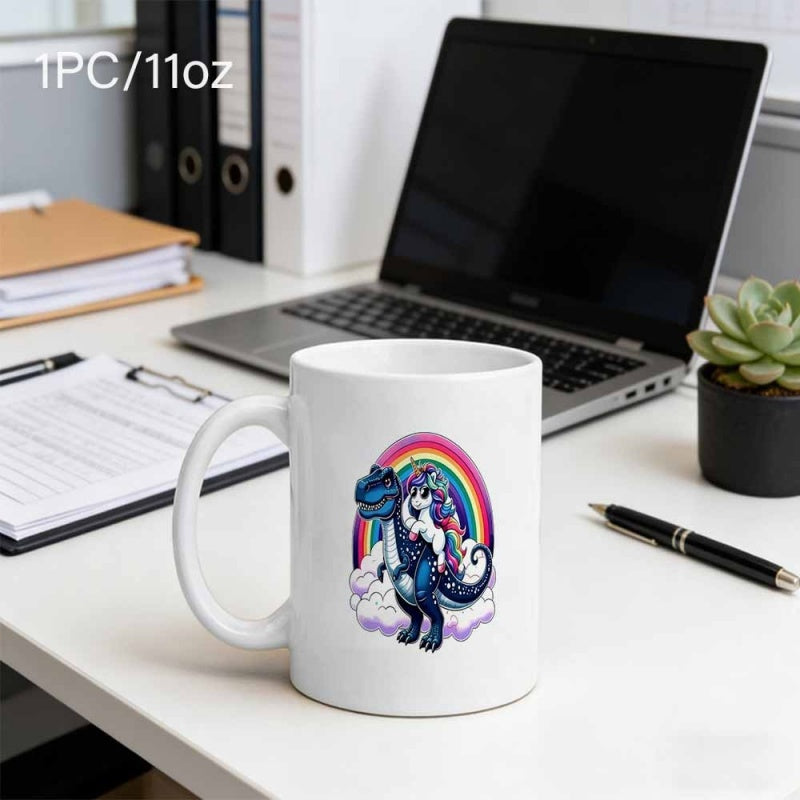 Tailorly White Ceramic 11 oz Mug - Whimsical Rainbow Sky With Unicorn Riding On A Mighty Blue Tyrannosaurus Dinosaur
