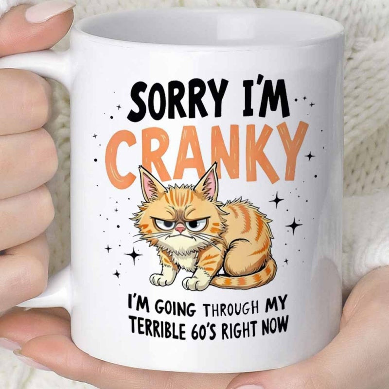 Tailorly White Ceramic 11 oz Mug - Sorry Im Cranky Im Going Through My Terrible 60s Right Now Animated Orange Tabby Cat With Grumpy Expression Among Black Stars