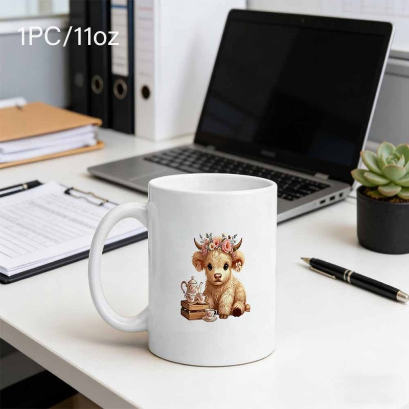 Tailorly White Ceramic 11 oz Mug - Cute Highland Cow Wearing Flowers Resting Near A Small Tea Crate Cow