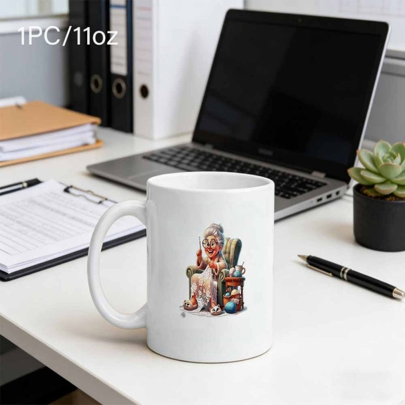 Tailorly White Ceramic 11 oz Mug - Cartoon Style Elderly Woman Sitting Comfortably On Chair Knitting Yarn Grandmother