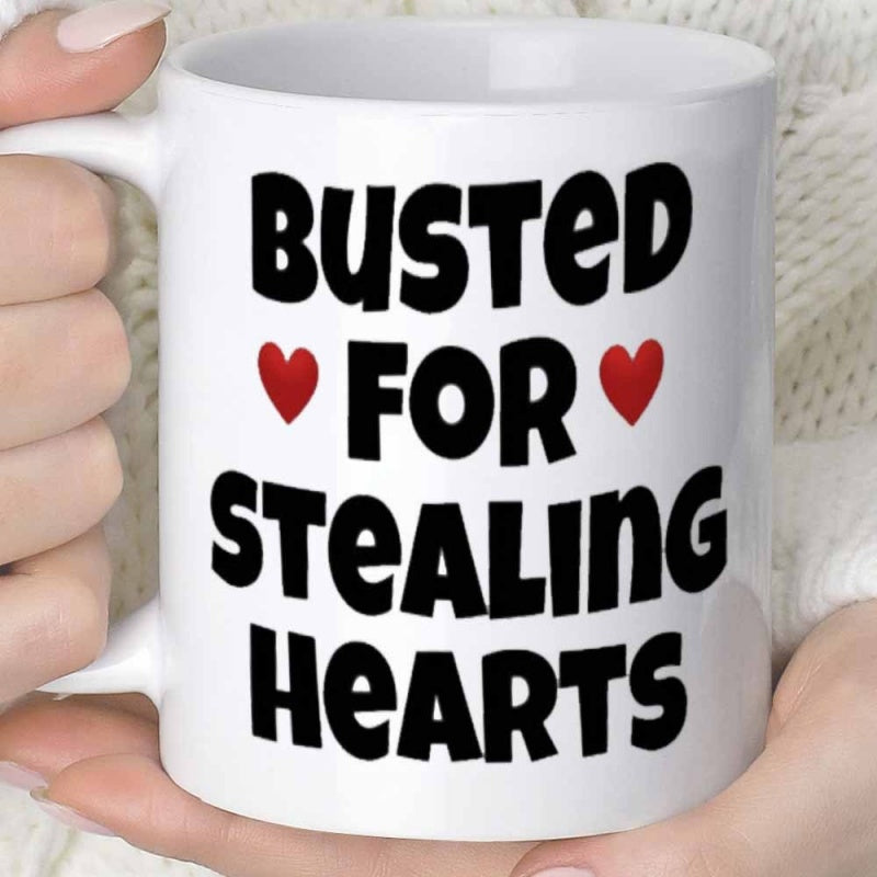 Tailorly White Ceramic 11 oz Mug - Busted For Stealing Hearts Simple Red Hearts Flanking Bold Text On A Minimalist