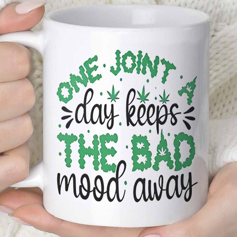 Tailorly White Ceramic 11 oz Mug - One Joint A Day Keeps The Bad Mood Away Stylized Green Bubble Lettering Featuring Small Cannabis Leaf Accents Mug