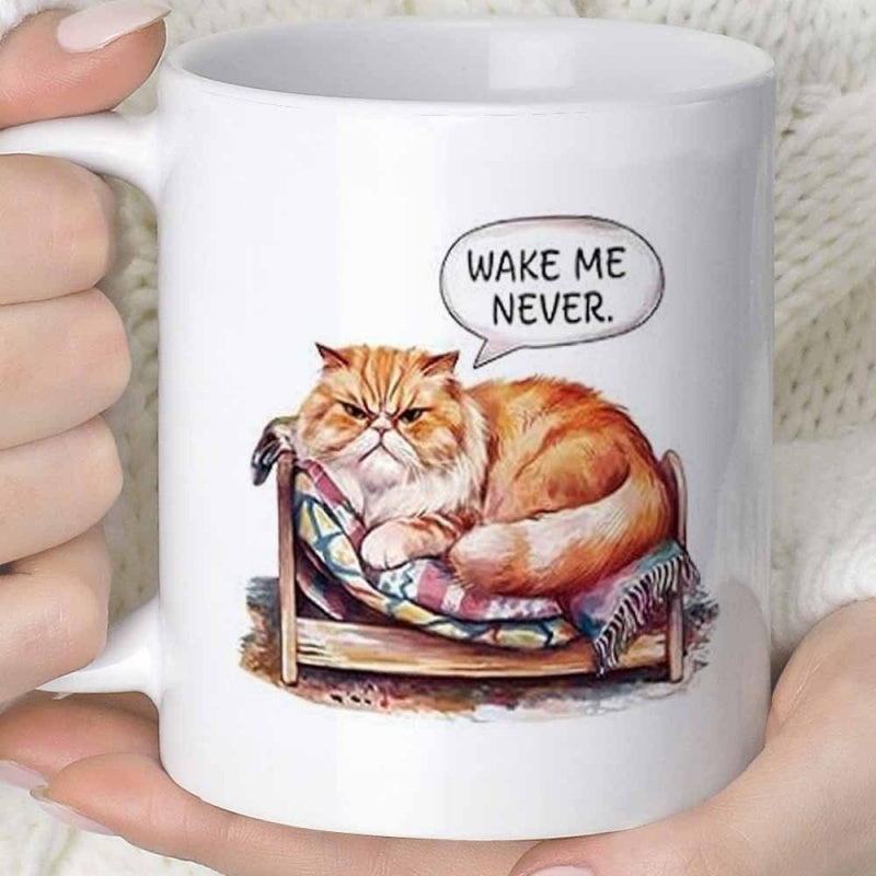 Tailorly White Ceramic 11 oz Mug - Wake Me Never Grumpy Ginger Fluffy Feline Resting On A Colorful Cozy Bed Cat
