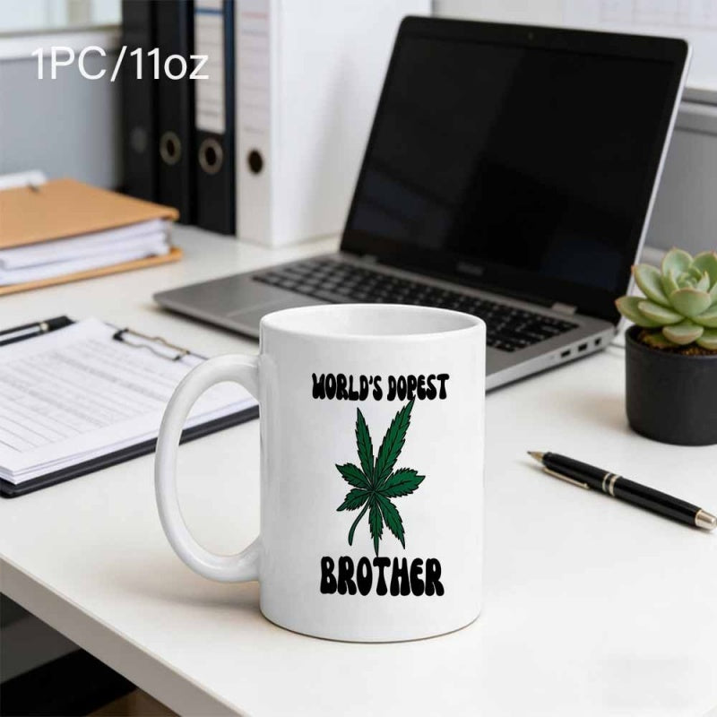 Tailorly White Ceramic 11 oz Mug - Worlds Dopest Brother Vibrant Green Serrated Foliage Design Centered On Ceramic Surface Leaf