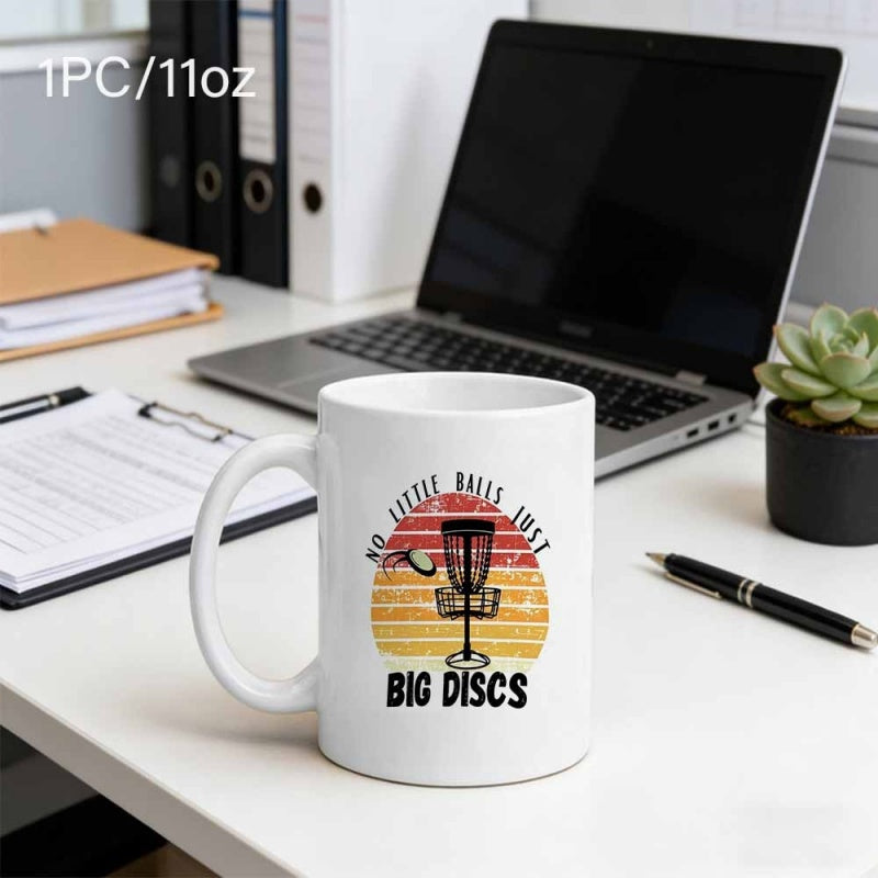 Tailorly White Ceramic 11 oz Mug - No Little Balls Just Big Discs Retro Sun With Horizontal Stripes Behind A Disc Golf Target Basket