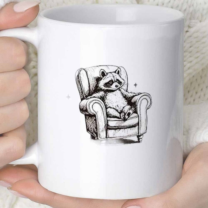 Tailorly White Ceramic 11 oz Mug - Hand Drawn Sketch Depicting A Relaxed Little Animal Resting On An Armchair Raccoon