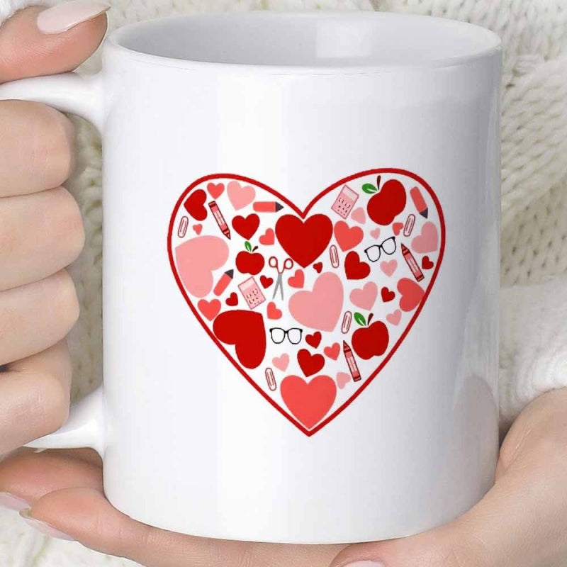 Tailorly White Ceramic 11 oz Mug - Filled With Tiny Pencils And Apples Within A Large Outline Heart