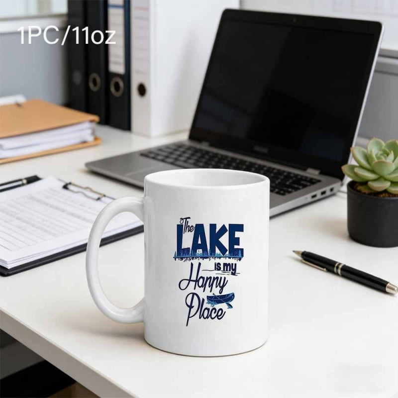 Tailorly White Ceramic 11 oz Mug - The Lake Is My Happy Place Small Wooden Rowboat Resting On Calm Water Beneath Serene Outdoor Typography Rowboat