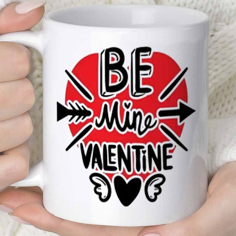 Tailorly White Ceramic 11 oz Mug - Be Mine Valentine Red Circle Background With Piercing Arrow And Winged Black Small Heart